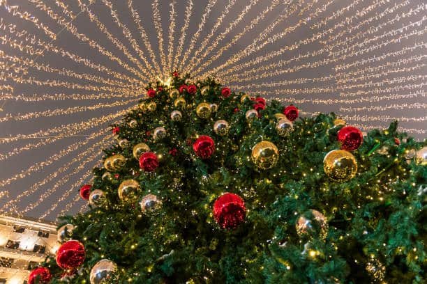 Christmas tree with red ornaments and lights in Southeast Asia