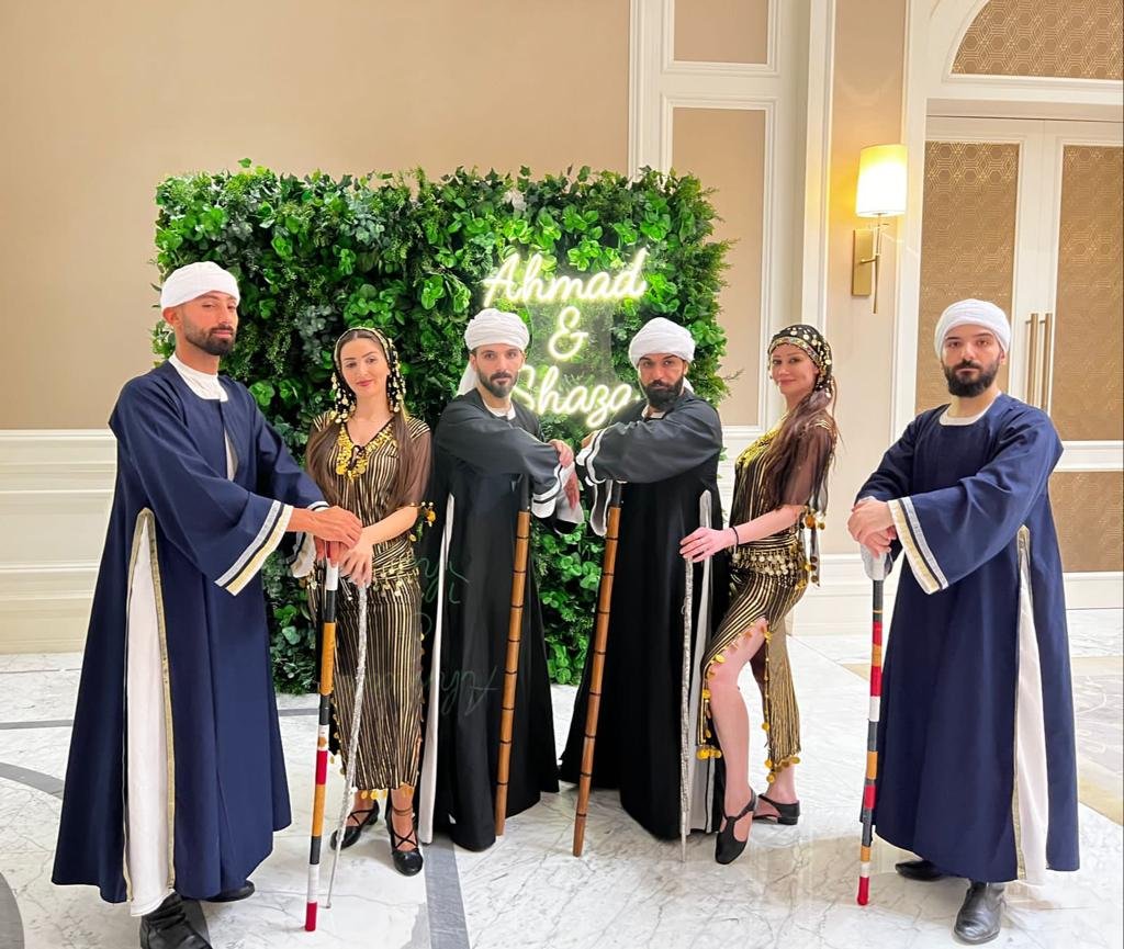 Dabke troupe in traditional costumes at a wedding Dabke troupe in traditional costumes at a wedding