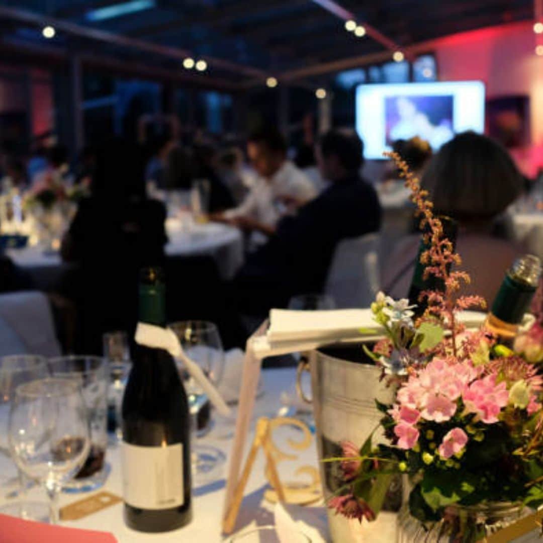 Gala dinner table with wine and flowers in Southeast Asia Gala dinner table with wine and flowers in Southeast Asia