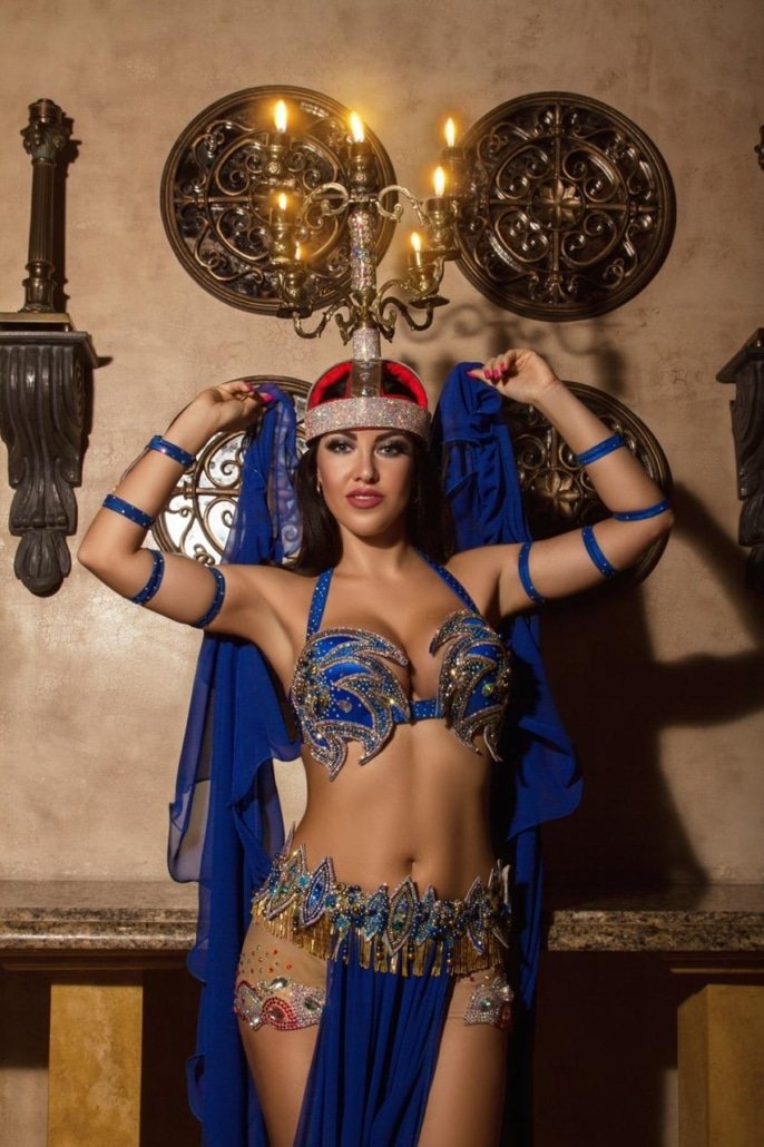 Belly dancer in a blue costume in Southeast Asia