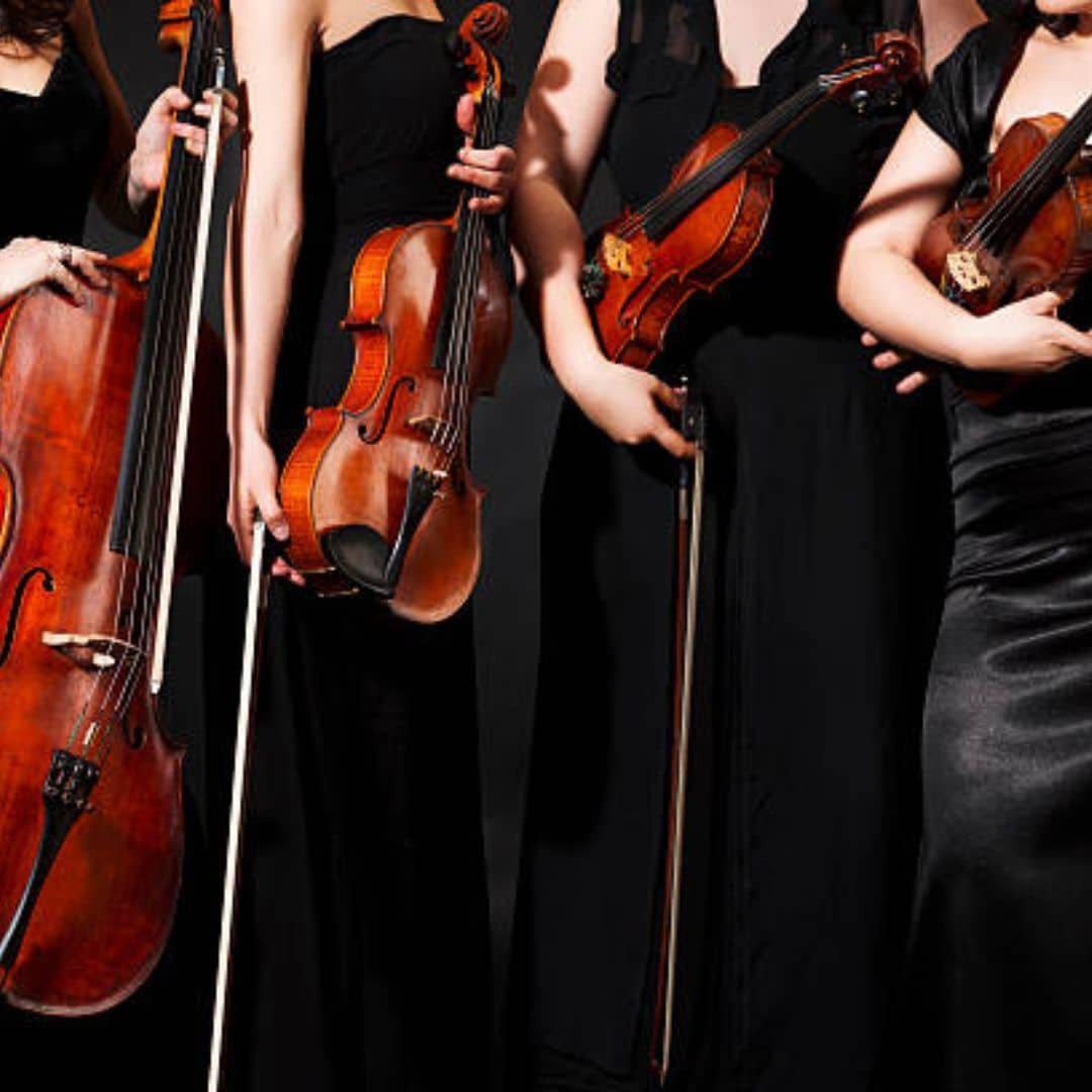 Female string quartet in black dresses in Southeast Asia
