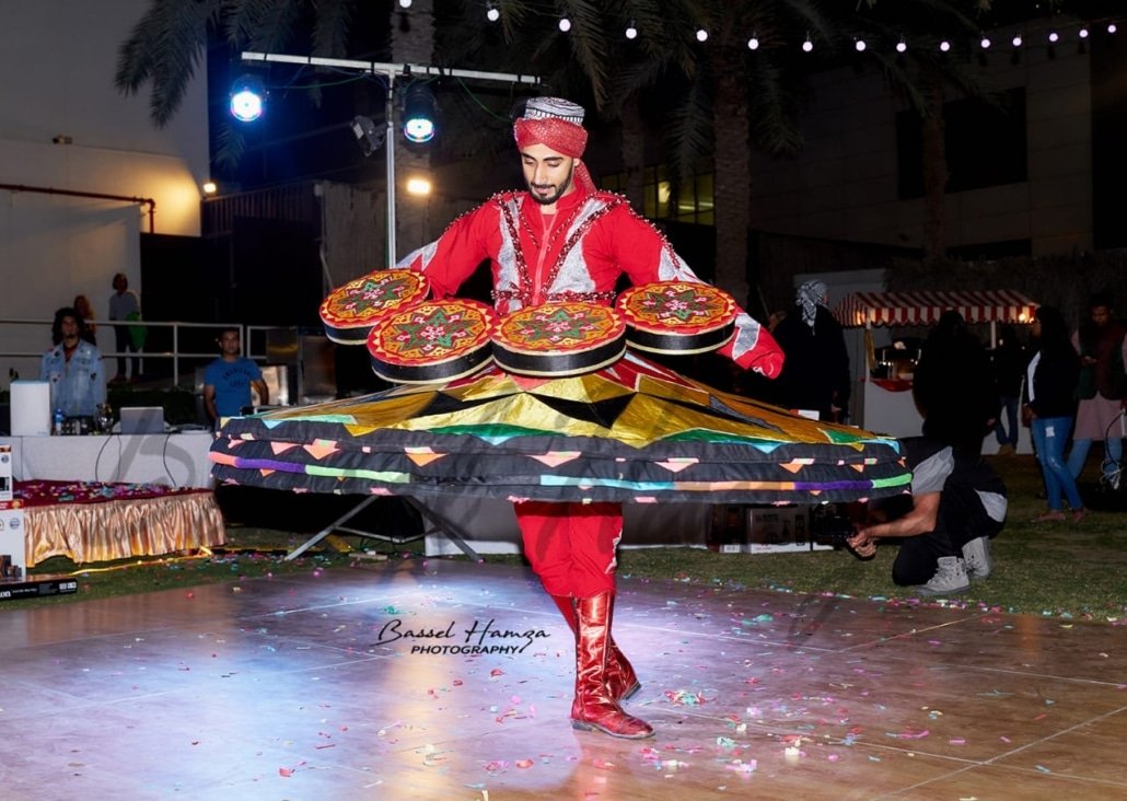 Tanoura dancer spinning a colourful skirt in Southeast Asia Tanoura dancer spinning a colourful skirt in Southeast Asia